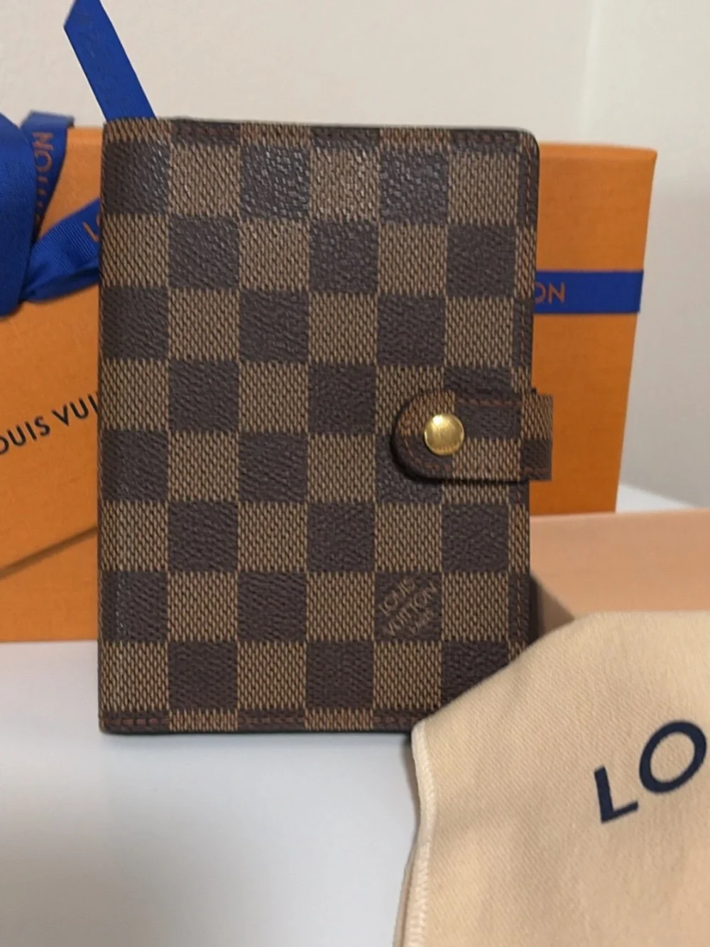 Louis Vuitton pocket agenda.